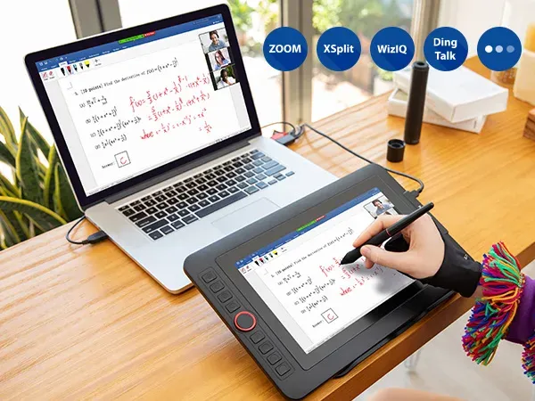 Workspace with computer and notebook for online learning
