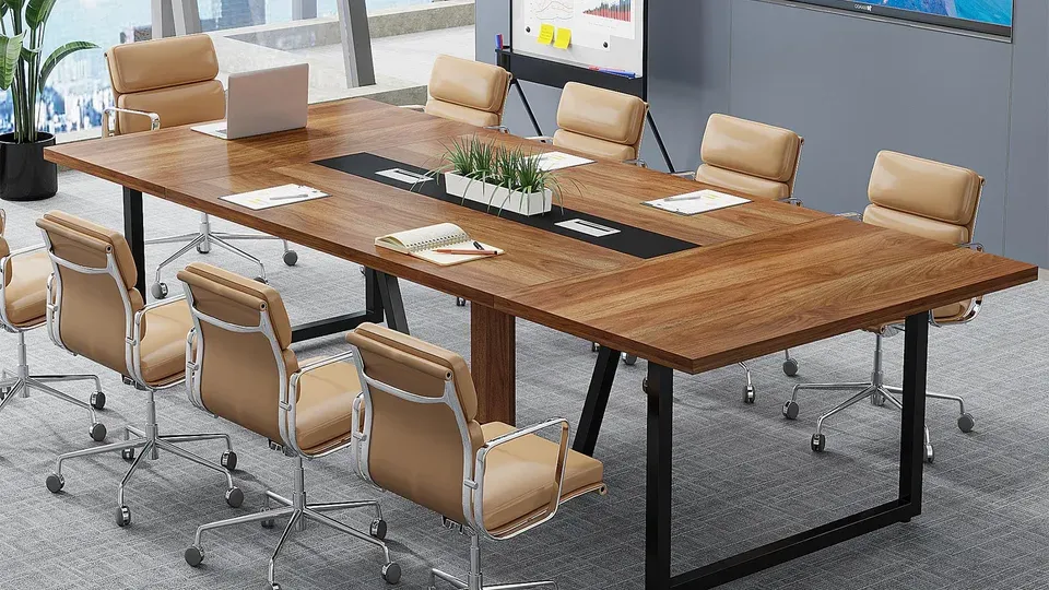 Business team collaborating at conference table during strategy meeting
