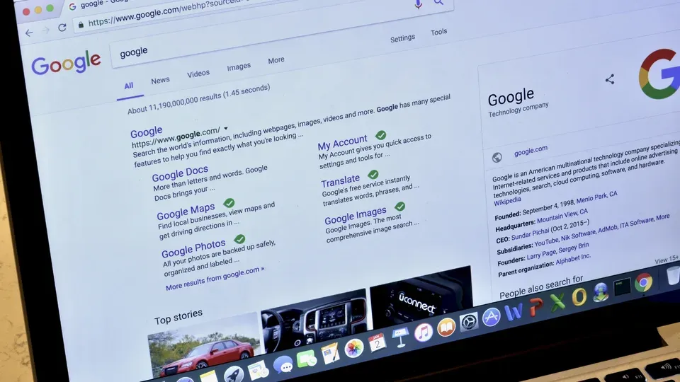 Laptop screen displaying search engine results with multiple ranked pages