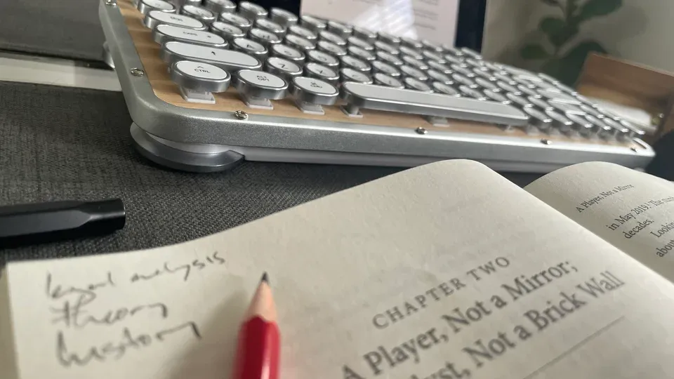 Keyword research planning materials on workspace desk