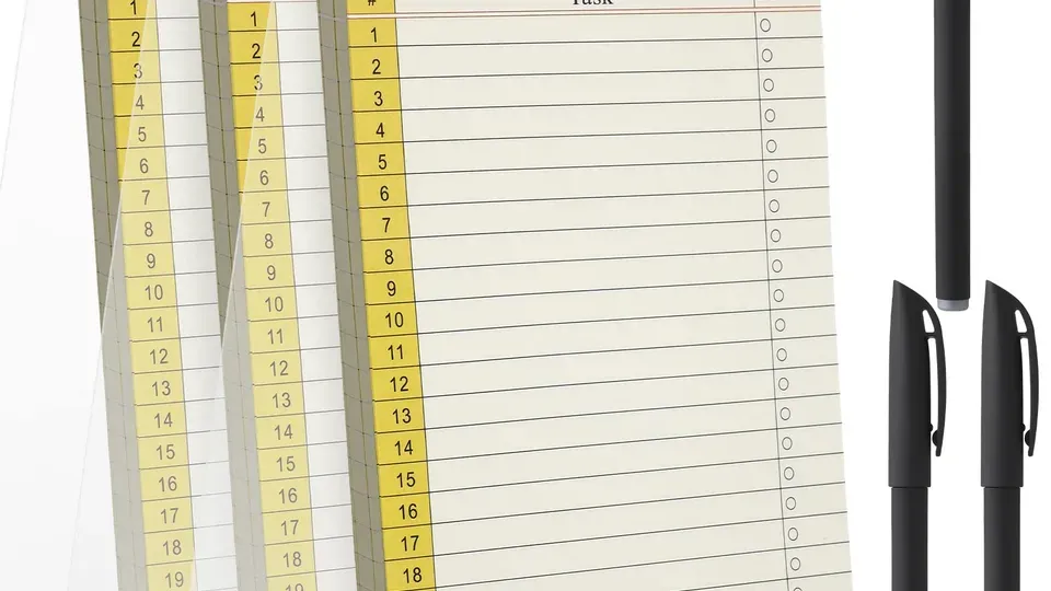 Checklist and planning materials on a desk workspace