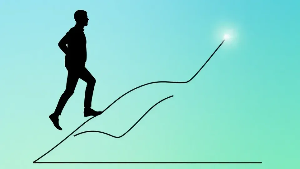 Silhouette figure climbing upward trending graph representing career growth