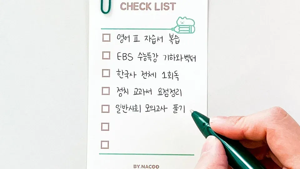 Printed checklist with pen marking completed items