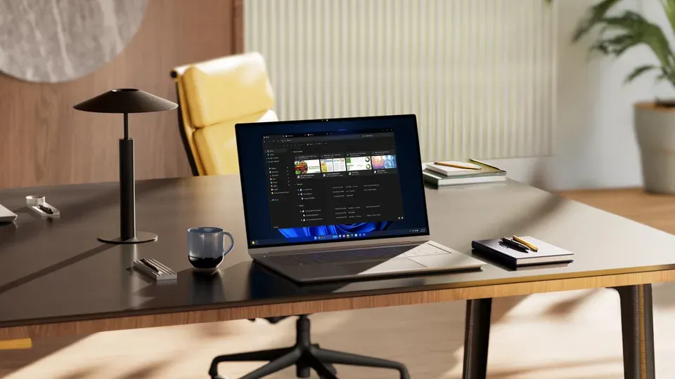Professional working at desk with laptop making strategic business decisions