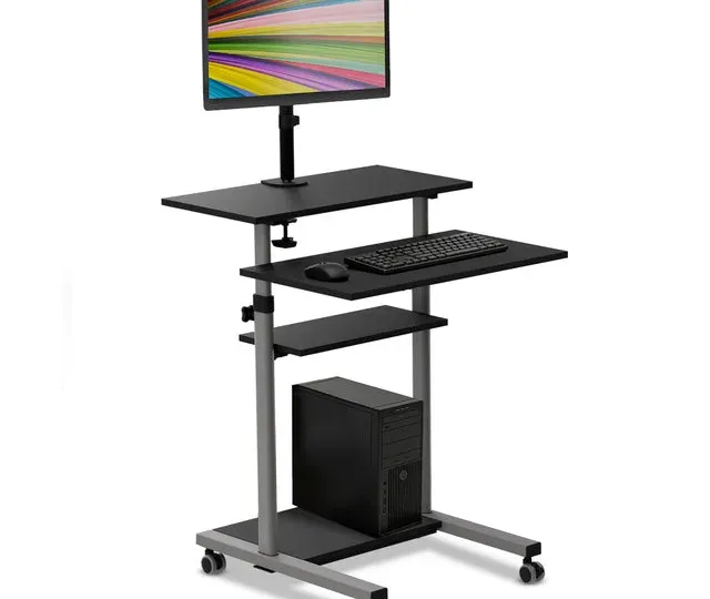 Professional desktop workspace with monitor, keyboard, and mouse setup